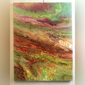 Poured artwork in warm colours